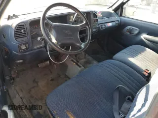 1995 GMC Sierra 1500 z VIN 2GTEK19K3S1591653, wystawiony jako Copart lot #75799124 z przebiegiem 329 311 mil mil oraz Nie do naprawy. Historia ofert i sprzedaży dostępna na DreamBid. Obrazek 8.