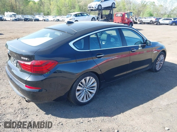 2014 BMW 5 Series GT 535i Gran Turismo xDrive with VIN WBA5M4C56ED183815, listed as a IAAI auction lot 42155348 with 150,357 mi miles and . Bid and sale history available at carsss.com. Image 4.