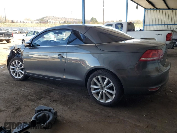 2014 Volkswagen Eos Komfort with VIN WVWBW8AH9EV006190, listed as a Copart auction lot 52390705 with 124,370 mi miles and Salvage Title. Bid and sale history available at DreamBid. Image 2.