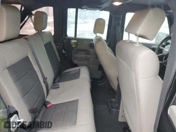 2009 Jeep Wrangler Unlimited X with VIN 1J4GA39119L755818, listed as a Copart auction lot 47886245 with 187,972 mi miles and Salvage Title. Bid and sale history available at carsss.com. Image 11.