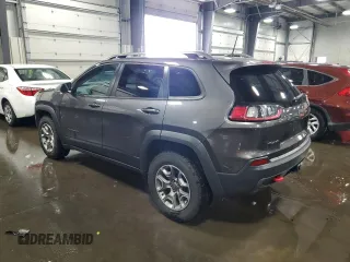2020 Jeep Cherokee Trailhawk with VIN 1C4PJMBX9LD582951, listed as a Copart auction lot 60152935 with 61,448 mi miles and Salvage title. Bid and sale history available at DreamBid. Image 2.