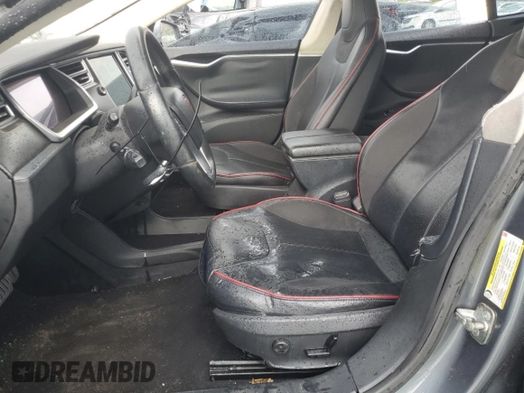2014 Tesla Model S 60 with VIN 5YJSA1H14EFP28471, listed as a Copart auction lot 64928534 with 99,442 mi miles and Clean Title. Bid and sale history available at DreamBid. Image 7.