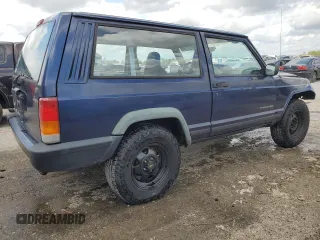 1997 Jeep Cherokee SE with VIN 1J4FT27P0VL612859, listed as a Copart auction lot 49869915 with 198,702 mi miles and Salvage title. Bid and sale history available at DreamBid. Image 3.