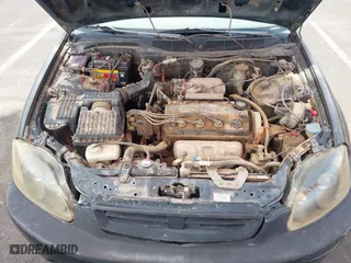 1997 Honda Civic EX with VIN 1HGEJ8243VL096134, listed as a IAAI auction lot 41929243 with 206,195 mi miles. Bid and sale history available at carsss.com. Image 10.