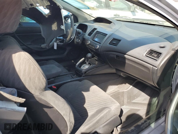 2009 Honda Civic Cpe EX with VIN 2HGFG128X9H502832, listed as a Copart auction lot 53076095 with 147,497 mi miles and Salvage Title. Bid and sale history available at carsss.com. Image 7.