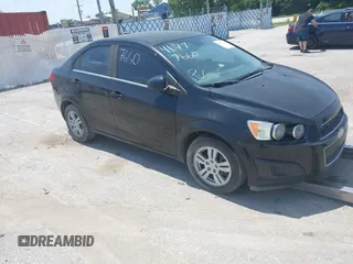 2012 Chevrolet Sonic LT with VIN 1G1JC5SHXC4163448, listed as a IAAI auction lot 41777660 with 103,854 mi miles and . Bid and sale history available at DreamBid. Image 1.