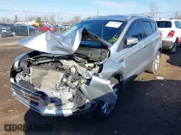 2015 Ford Escape Titanium with VIN 1FMCU0J93FUC02844, listed as a IAAI auction lot 41531293 with 115,392 mi miles and . Bid and sale history available at DreamBid. Image 23.