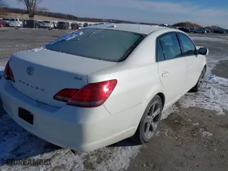 2009 Toyota Avalon XL with VIN 4T1BK36B49U341917, listed as a IAAI auction lot 40955142 with 201,734 mi miles. Bid and sale history available at carsss.com. Image 4.