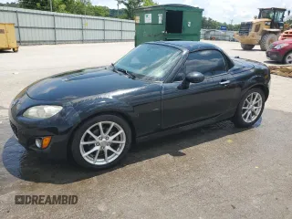 2009 Mazda MX-5 Miata Grand Touring with VIN JM1NC26F390204924, listed as a Copart auction lot 63492955 with 215,707 mi miles and Salvage title. Bid and sale history available at DreamBid. Image 1.