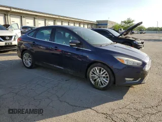 2017 Ford Focus Titanium with VIN 1FADP3J2XHL203959, listed as a Copart auction lot 55498465 with 68,154 mi miles and Salvage title. Bid and sale history available at DreamBid. Image 4.
