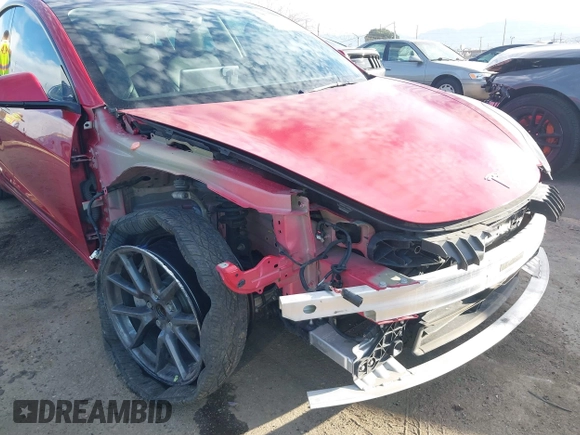 2022 Tesla Model 3 with VIN 5YJ3E1EA1NF288903, listed as a IAAI auction lot 41610215 with 96,050 mi miles and . Bid and sale history available at DreamBid. Image 6.