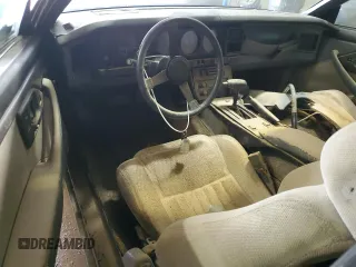 1987 Pontiac Firebird with VIN 1G2FS21S4HN213083, listed as a Copart auction lot 69101254 with 172,214 mi miles and Salvage title. Bid and sale history available at DreamBid. Image 8.