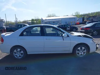 2009 Kia Spectra EX z VIN KNAFE222595616439, wystawiony jako IAAI lot #42117197 z przebiegiem 79 882 mil mil oraz . Historia ofert i sprzedaży dostępna na DreamBid. Obrazek 13.