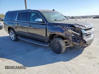 2016 Chevrolet Suburban LTZ with VIN 1GNSCJKC5GR170929, listed as a Copart auction lot 49634725 with Not provided miles and Salvage title. Bid and sale history available at DreamBid. Image 4.