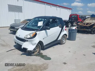 2009 Smart fortwo Pure with VIN WMEEJ31XX9K302737, listed as a IAAI auction lot 42124550 with 43,610 mi miles and . Bid and sale history available at DreamBid. Image 17.