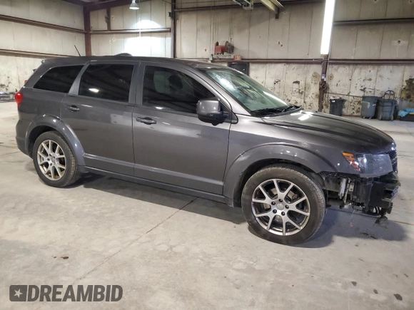 2014 Dodge Journey R/T with VIN 3C4PDCEG3ET309644, listed as a Copart auction lot 53986465 with 136,769 mi miles and Salvage title. Bid and sale history available at DreamBid. Image 4.