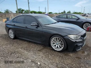 2014 BMW 3 Series 335i xDrive with VIN WBA3B9G53ENR92266, listed as a Copart auction lot 58800785 with 148,565 mi miles and Clean title. Bid and sale history available at DreamBid. Image 4.
