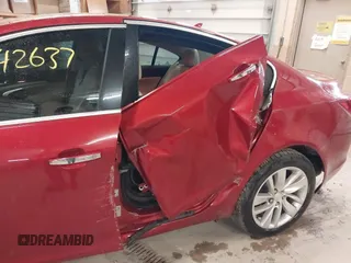 2014 Buick Regal Premium I with VIN 2G4GN5EX0E9171875, listed as a IAAI auction lot 42642637 with 129,479 mi miles and . Bid and sale history available at DreamBid. Image 6.