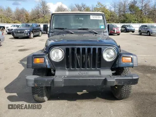 1999 Jeep Wrangler Sport z VIN 1J4FY19SXXP465037, wystawiony jako Copart lot #54772405 z przebiegiem 50 942 mil mil oraz Nie do naprawy • Non repairable. Historia ofert i sprzedaży dostępna na DreamBid. Obrazek 5.