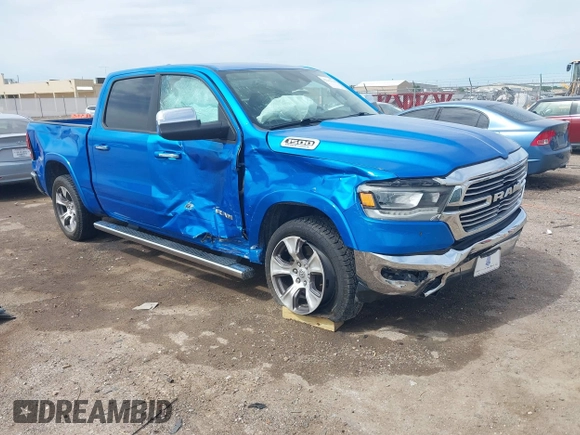 2021 Ram 1500 Laramie with VIN 1C6SRFJT1MN774879, listed as a IAAI auction lot 42242318 with 51,971 mi miles and . Bid and sale history available at DreamBid. Image 1.