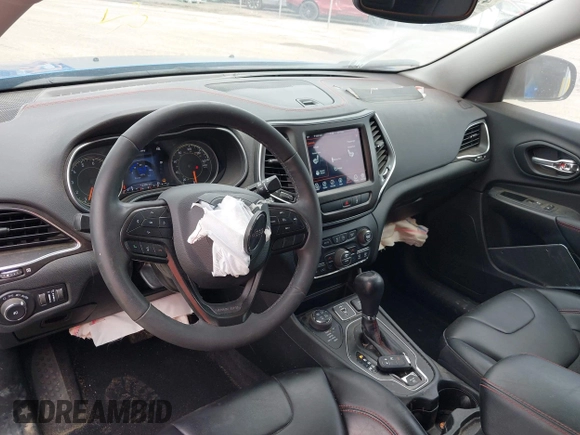 2022 Jeep Cherokee Trailhawk z VIN 1C4PJMBX4ND513488, wystawiony jako IAAI lot #42137114 z przebiegiem 12 306 mil mil oraz . Historia ofert i sprzedaży dostępna na DreamBid. Obrazek 18.