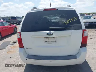 2010 Kia Sedona LX with VIN KNDMG4C33A6338047, listed as a IAAI auction lot 42128485 with 99,498 mi miles and . Bid and sale history available at carsss.com. Image 17.