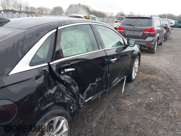2015 Cadillac XTS Luxury with VIN 2G61M5S38F9138545, listed as a IAAI auction lot 41690696 with 136,460 mi miles and . Bid and sale history available at DreamBid. Image 6.