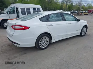 2013 Ford Fusion SE Hybrid with VIN 3FA6P0LUXDR328784, listed as a IAAI auction lot 42231399 with 169,462 mi miles and . Bid and sale history available at carsss.com. Image 4.