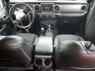 2020 Jeep Wrangler Unlimited Freedom with VIN 1C4HJXDG0LW285901, listed as a Copart auction lot 52193555 with 63,823 mi miles and Salvage title. Bid and sale history available at DreamBid. Image 8.