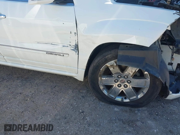 2013 GMC Acadia Denali with VIN 1GKKVTKD5DJ205295, listed as a IAAI auction lot 41708410 with 192,493 mi miles. Bid and sale history available at carsss.com. Image 6.