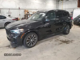 2021 BMW X5 xDrive45e with VIN 5UXTA6C02M9F45757, listed as a Copart auction lot 61991985 with 65,162 mi miles and Salvage title. Bid and sale history available at DreamBid. Image 1.