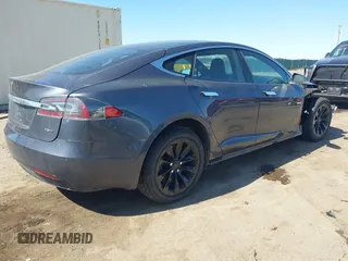 2018 Tesla Model S 75D with VIN 5YJSA1E21JF287115, listed as a IAAI auction lot 41850318 with Not provided miles and . Bid and sale history available at DreamBid. Image 4.