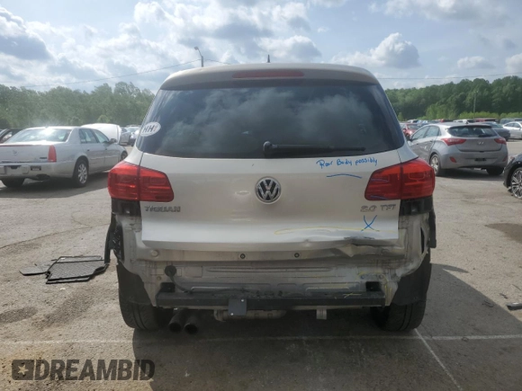 2013 Volkswagen Tiguan S z VIN WVGAV3AX2DW616476, wystawiony jako Copart lot #55313615 z przebiegiem 129 105 mil mil oraz Szkody całkowita. Historia ofert i sprzedaży dostępna na DreamBid. Obrazek 6.