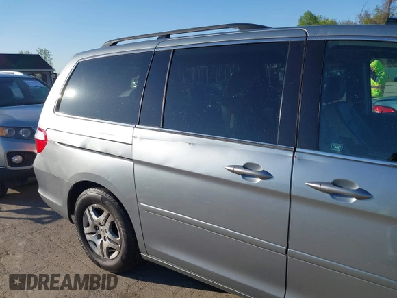 2007 Honda Odyssey EX-L with VIN 5FNRL387X7B140294, listed as a IAAI auction lot 41995795 with 202,934 mi miles. Bid and sale history available at carsss.com. Image 18.