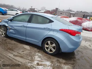 2013 Hyundai Elantra GLS PZEV with VIN KMHDH4AE8DU496607, listed as a IAAI auction lot 41432760 with 165,115 mi miles. Bid and sale history available at carsss.com. Image 3.