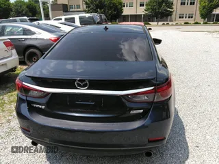 2016 Mazda 6 i Grand Touring с VIN JM1GJ1W55G1430860, выставлен на аукционе IAAI как лот 42485686 с пробегом 121 653 миль миль и . История ставок и продаж доступна на DreamBid. Изображение 16.