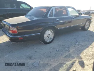1995 Jaguar XJ with VIN SAJKX1743SC734007, listed as a Copart auction lot 46340825 with 130,115 mi miles and Salvage Title. Bid and sale history available at DreamBid. Image 3.