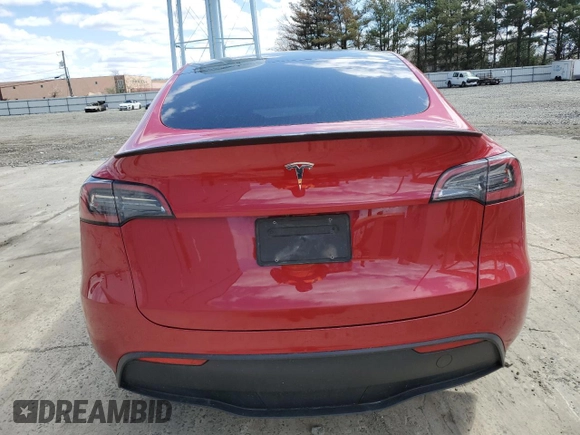 2023 Tesla Model Y Performance z VIN 7SAYGDEF2PF591238, wystawiony jako Copart lot #51991025 z przebiegiem 44 749 mil mil oraz Szkoda całkowita • Salvage title. Historia ofert i sprzedaży dostępna na DreamBid. Obrazek 6.