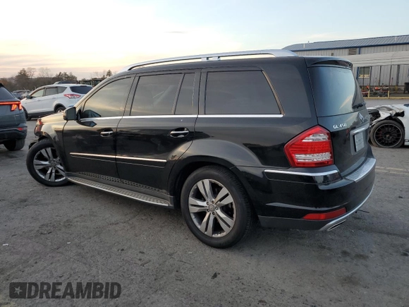 2012 Mercedes-Benz GL-Class GL 450 with VIN 4JGBF7BE6CA780282, listed as a Copart auction lot 79071644 with 156,894 mi miles and Salvage Title. Bid and sale history available at carsss.com. Image 2.