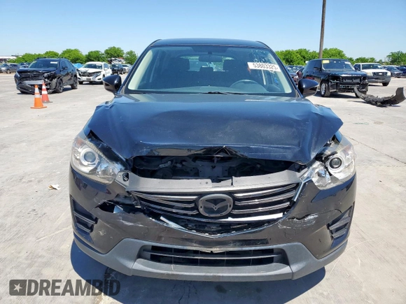 2016 Mazda CX-5 Sport z VIN JM3KE2BY3G0886115, wystawiony jako Copart lot #53803325 z przebiegiem Nie podano mil oraz Szkoda całkowita • Salvage title. Historia ofert i sprzedaży dostępna na DreamBid. Obrazek 5.