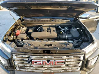 2023 GMC Canyon 4WD Denali with VIN 1GTP6FEK8P1164692, listed as a Copart auction lot 77033234 with 5,644 mi miles and Salvage Title. Bid and sale history available at carsss.com. Image 11.