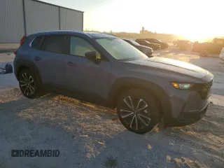 2023 Mazda CX-50 S Premium Plus with VIN 7MMVABEM3PN102285, listed as a Copart auction lot 77684064 with 14,190 mi miles and Salvage Title. Bid and sale history available at DreamBid. Image 4.