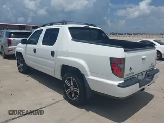 2014 Honda Ridgeline Sport with VIN 5FPYK1F71EB011340, listed as a IAAI auction lot 42741956 with 156,149 mi miles and . Bid and sale history available at DreamBid. Image 3.