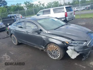 2017 Ford Fusion SE with VIN 3FA6P0T96HR140314, listed as a IAAI auction lot 42325348 with 156,256 mi miles and . Bid and sale history available at DreamBid. Image 1.