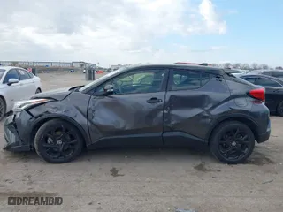 2021 Toyota C-HR LE with VIN JTNKHMBX9M1118773, listed as a IAAI auction lot 41115157 with 57,289 mi miles. Bid and sale history available at carsss.com. Image 14.