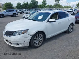 2013 Lincoln MKS EcoBoost with VIN 1LNHL9FT0DG606567, listed as a IAAI auction lot 42561162 with 285,830 mi miles and . Bid and sale history available at DreamBid. Image 18.
