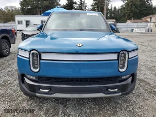 2022 Rivian R1T Launch Edition with VIN 7FCTGAAL0NN001418, listed as a Copart auction lot 75002264 with 28,835 mi miles and Salvage Title. Bid and sale history available at carsss.com. Image 5.