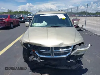 2011 Dodge Journey Mainstreet with VIN 3D4PH1FG9BT565356, listed as a IAAI auction lot 42808442 with 202,574 mi miles and . Bid and sale history available at DreamBid. Image 13.