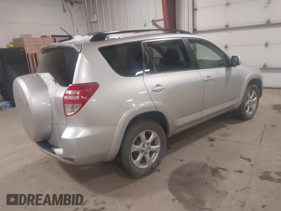 2009 Toyota RAV4 Ltd with VIN JTMBF31VX9D017204, listed as a IAAI auction lot 41630093 with 210,590 mi miles. Bid and sale history available at carsss.com. Image 4.