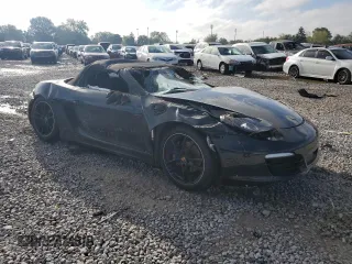 2014 Porsche Boxster z VIN WP0CA2A89ES121812, wystawiony jako Copart lot #73873054 z przebiegiem Nie podano mil oraz Szkoda całkowita • Salvage title. Historia ofert i sprzedaży dostępna na DreamBid. Obrazek 4.
